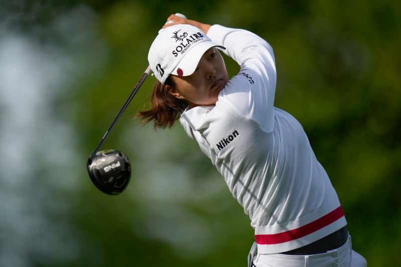 Jin Young Ko, of South Korea, hits off the 13th tee during the first round of the LPGA Cognizant Founders Cup golf tournament, Thursday, May 9, 2024, in Clifton, N.J. (AP Photo/Seth Wenig)