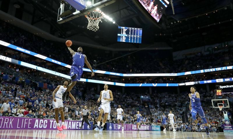 Zion Williamson of the Duke Blue Devils dunks the ball against the North Carolina Tar Heels.  (Photo by Streeter Lecka/Getty Images)