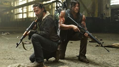 Andrew Lincoln as Rick Grimes and Norman Reedus as Daryl Dixon - The Walking Dead _ Season 5, Gallery - Photo Credit: Frank Ockenfels 3/AMC Our buds Andrew Lincoln and Norman Reedus in a pickle as usual. CREDIT: AMC
