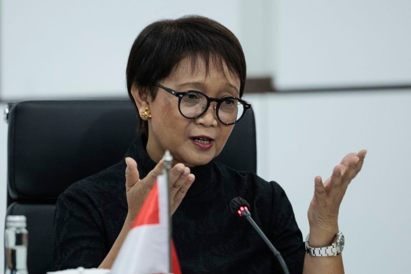 Indonesian Foreign Minister Retno Marsudi gestures as she speaks during a bilateral meeting with Chinese Foreign Minister Wang Yi in Jakarta, Indonesia, Thursday, April 18, 2024. The Chinese and Indonesian foreign ministers called for an immediate and lasting cease-fire in Gaza after a meeting in Jakarta on Thursday, condemning the humanitarian costs of the ongoing war that has killed tens of thousands of Palestinians. (Yasuyoshi Chiba/Pool Photo via AP)