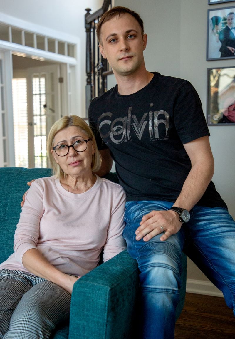  Igor Lutsenko sits in his Lawrenceville home with his mother, Lyudmila Soloshenko Friday, March 4, 2022. STEVE SCHAEFER FOR THE ATLANTA JOURNAL-CONSTITUTION