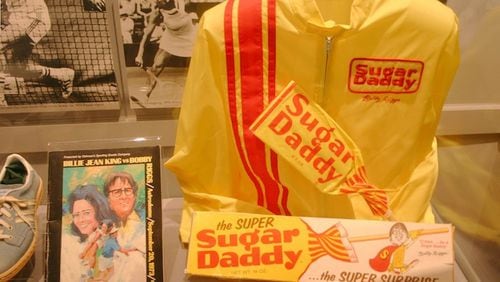 Among memorabilia from the 1973 Billie Jean King/ Bobby Riggs tennis match is Riggs' warmup jacket from his sponsor, Sugar Daddy candy maker. (Handout/TNS)