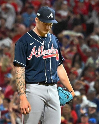 Atlanta Braves pitcher AJ Smith-Shawver (62) reacts after giving up back-to-back Philadelphia Phillies home runs during the eighth inning of NLDS Game 3 in Philadelphia on Wednesday, Oct. 11, 2023.   (Hyosub Shin / Hyosub.Shin@ajc.com)