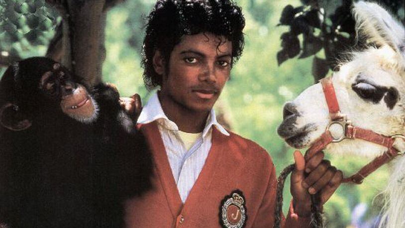 Michael Jackson with Bubbles and a pet llama in 1984. Photo by GAB Archive/Redferns