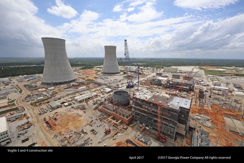 The cooling towers for Plant Vogtle reactors 3 and 4 rise above the construction sites. The units are located in Waynesboro, Georgia. GEORGIA POWER