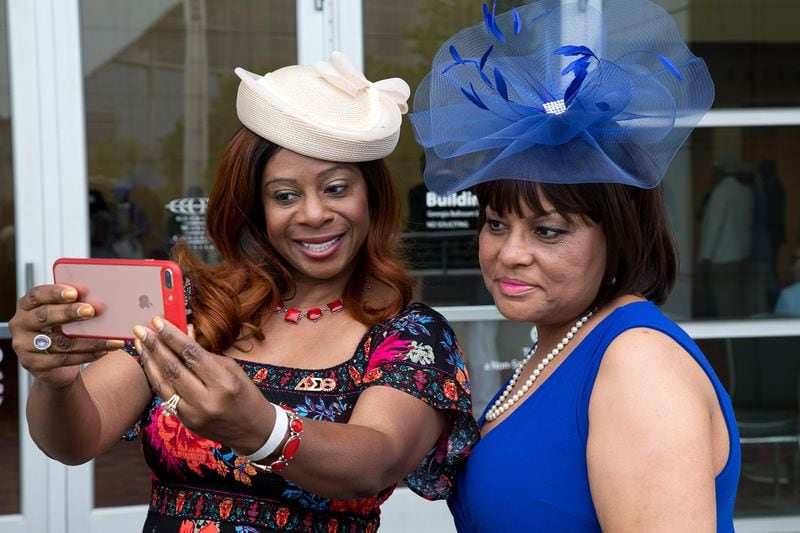 Dorthy Watts (L) and Barbara Essex take a photograph during the 2018 Alpha Derby, a fundraising event sponsored by The Alphas of Atlanta. STEVE SCHAEFER / SPECIAL TO THE AJC