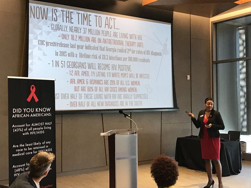 Nicole Roebuck, executive director of AID Atlanta, gives a briefing on HIV in Atlanta to members of the media. Roebuck said she is unimpressed with new CDC data showing the time between infection and diagnosis has decreased some. Contributed