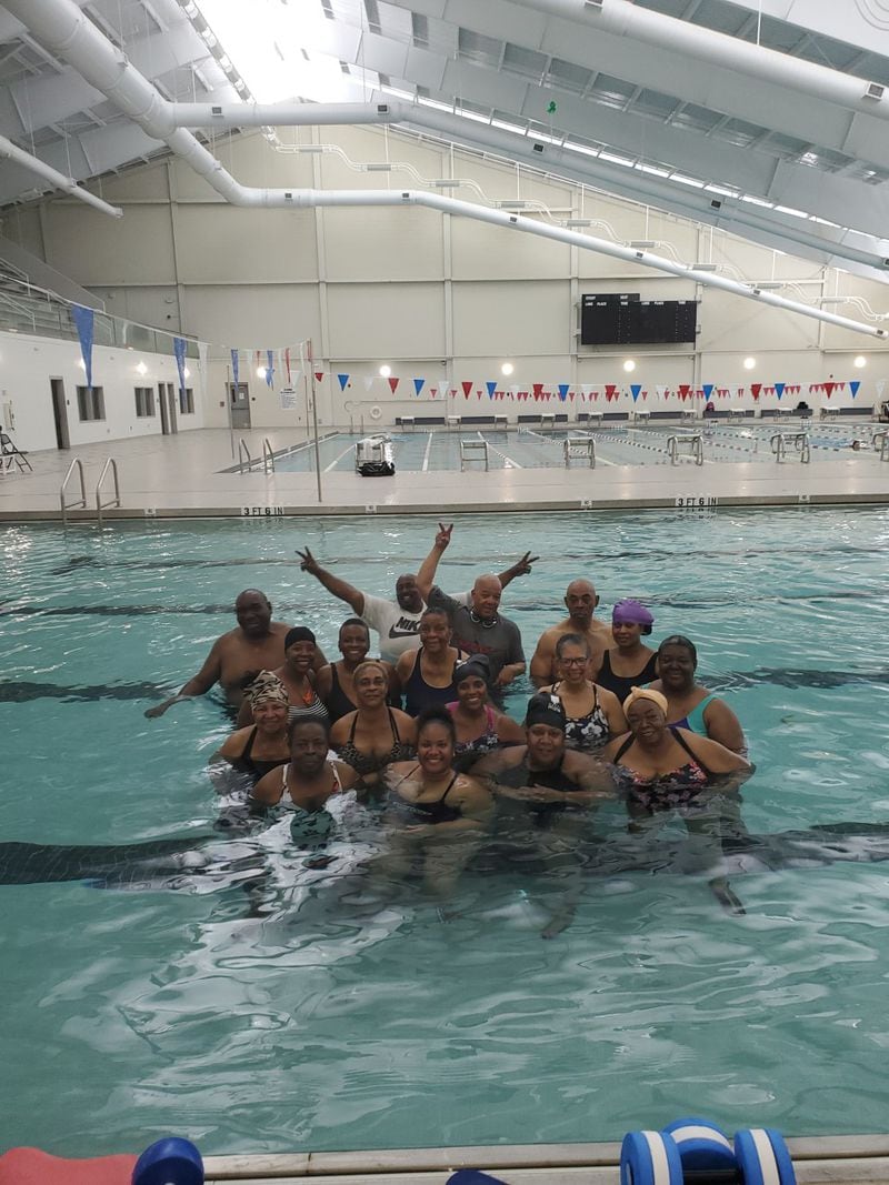 Water aerobics participants pause during a workout at one of the City of Atlanta Department of Parks and Recreation’s natatorium facilities.