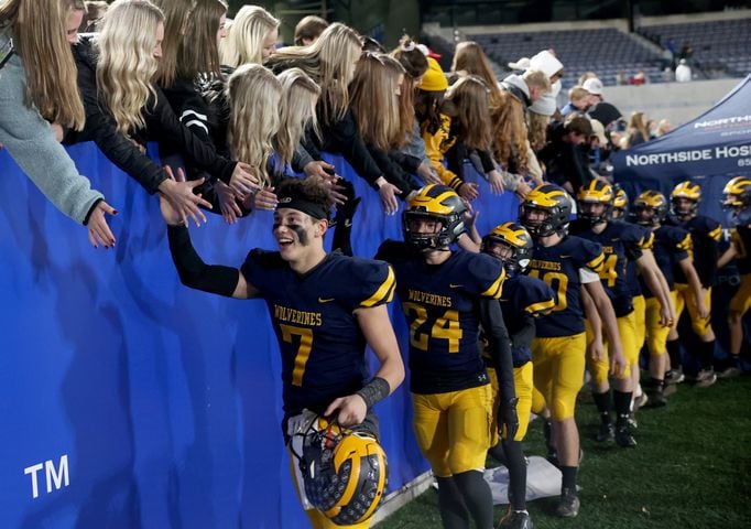 Prince Avenue Christian wide receiver Phillip Kelley (7) and teammates celebrate with fans after their 41-21 win against Trinity Christian during the Class 1A Private championship at Center Parc Stadium Monday, December 28, 2020 in Atlanta, Ga.. JASON GETZ FOR THE ATLANTA JOURNAL-CONSTITUTION