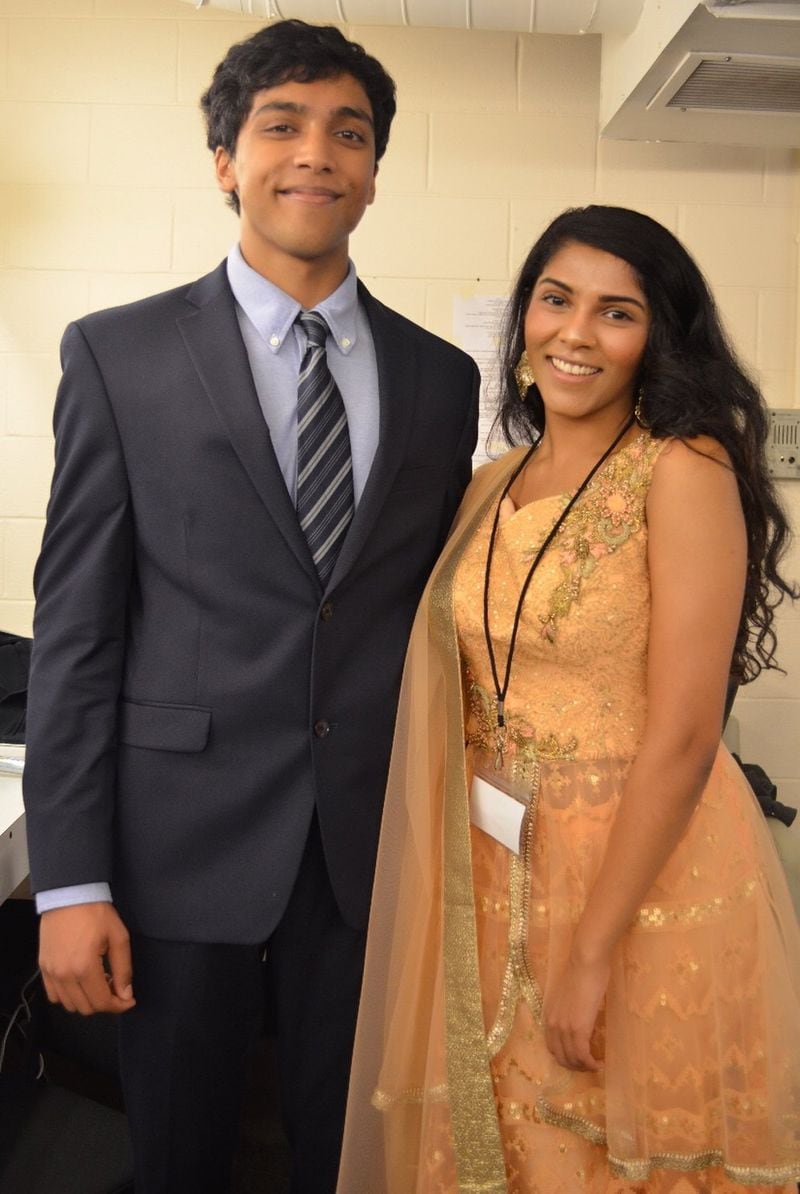 Now a senior at Emory University, Sunidhi Ramesh seeks out connections to her roots through extracurriculars like leading the board planning ATL Tamasha, Georgia Tech’s Premier Fall Dance Competition, featuring Bollywood Fusion, Raas-Garba, and Bhangra teams from across the region. Here, Ramesh poses with her younger brother, Sireesh. CONTRIBUTED