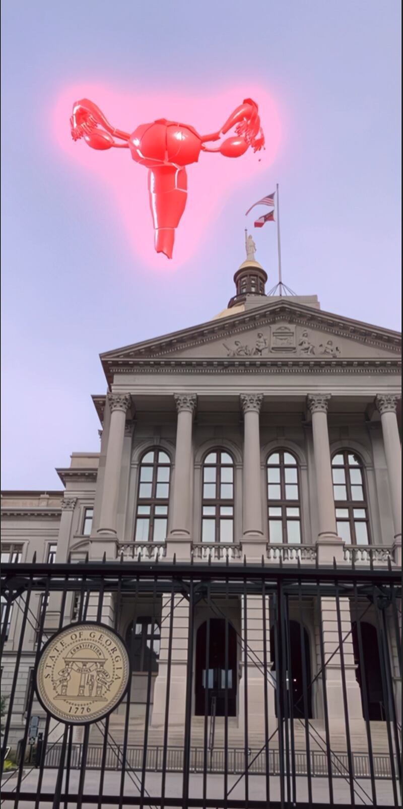 "State Property," a digital neon sculpture seen above Georgia’s State House.