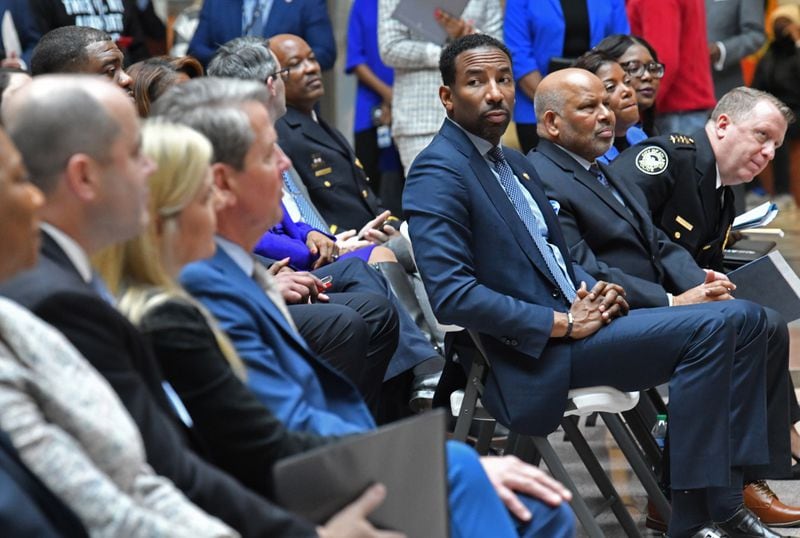 Atlanta Mayor Andre Dickens (center right) has worked to mend relationships with Gov. Brian Kemp (center left) and other state Republican leaders as a hedge against efforts to split Buckhead from the rest of the city. (Hyosub Shin / Hyosub.Shin@ajc.com)