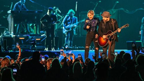 Sugarland's Jennifer Nettles and Kristian Bush play to the crowd at Mercedes-Benz Stadium fior ATLive on Nov. 15, 2019. Photo: Ryan Fleisher/Special to the AJC.