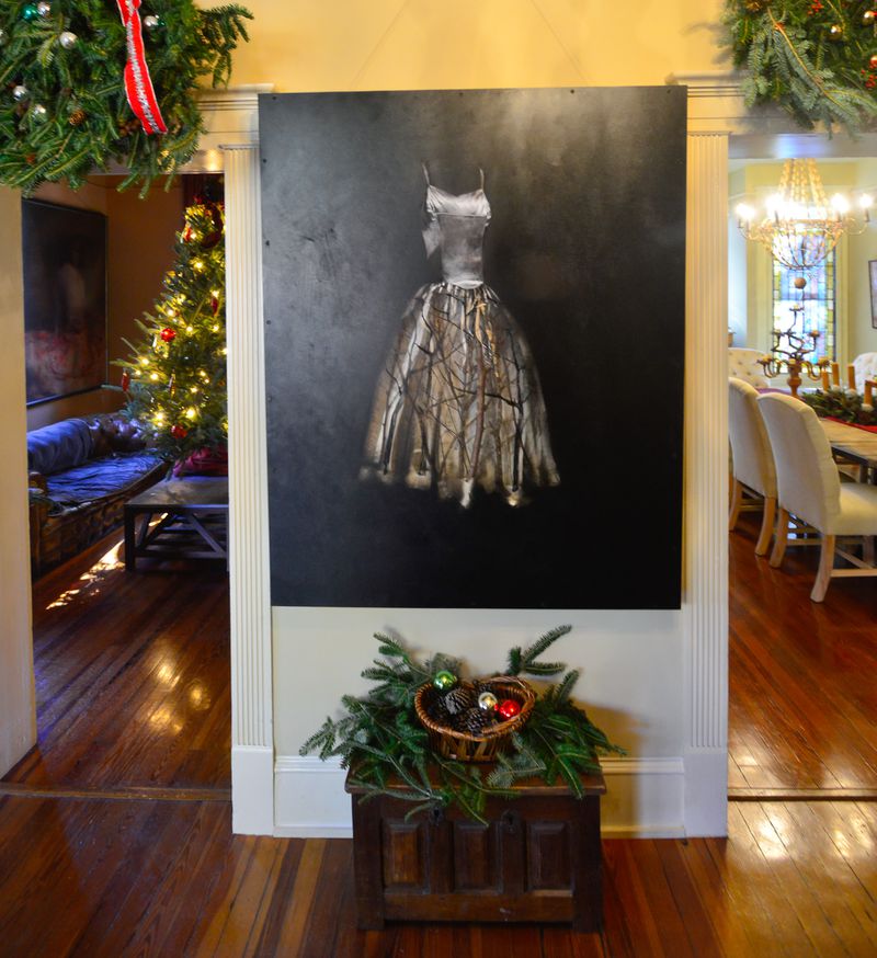 This Todd Murphy mixed media piece used an mage that he would return to many times, the image of a woman's dress, often an empty dress. FILE PHOTO