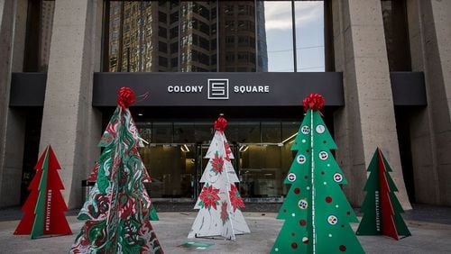 Image from the first annual Festivity + Trees at Colony Square in Midtown. This year, the event returns with 25 new trees designed by local artists.