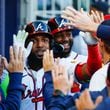 Atlanta Braves designated hitter Marcell Ozuna celebrates with teammates as Michael Harris II follows after hitting a three-run home run during the first inning against the Texas Rangers at Truist Park on Sunday, April 21, 2024, in Atlanta.
(Miguel Martinez/ AJC)