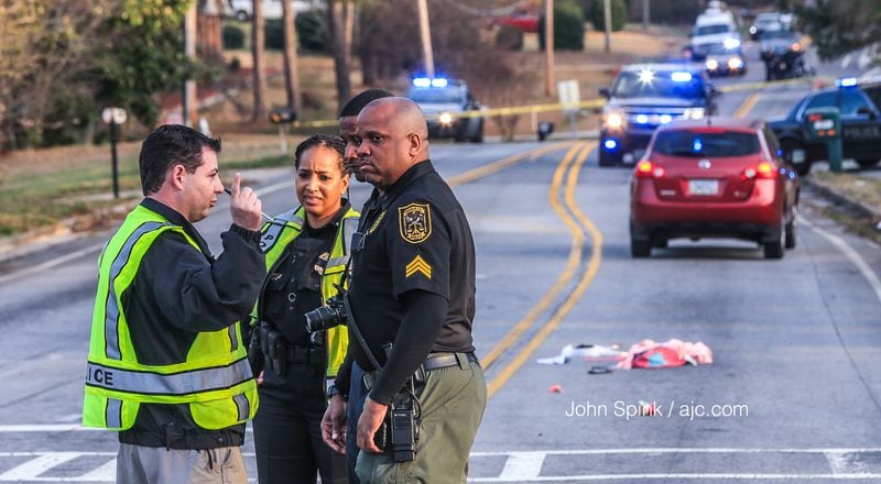 A mother and an 8-year-old girl were struck by a car Friday in DeKalb County.