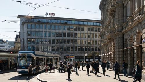
                        FILE — The UBS bank and Credit Suisse bank buildings in downtown Zurich, Switzerland, on April 4, 2023. The International Monetary Fund's warning follows weeks of turmoil in the global banking sector, which included UBS’s takeover of Credit Suisse. (Marvin Zilm/The New York Times)
                      