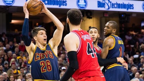 Kyle Korver (26) of the Cleveland Cavaliers looks for a pass while under pressure from Nikola Mirotic (44) of the Chicago Bulls during the first half at Quicken Loans Arena on February 25, 2017 in Cleveland, Ohio. (Photo by Jason Miller/Getty Images)