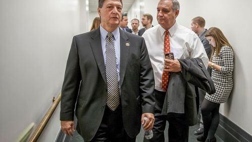 Rep. Lynn Westmoreland, R-Ga., left, and Rep. Jeff Miller, R-Fla., leave a January 2015 meeting of House Republicans. (AP/J. Scott Applewhite)