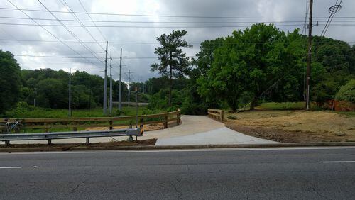The new extension of South Peachtree Creek Trail connects to a crosswalk on North Druid Hills Road, and the residential areas to the north.