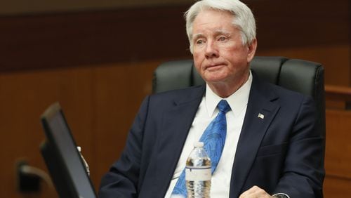 Tex McIver watches defense co-counsel Don Samuel during final arguments at McIver's murder trial in April 2018 at the Fulton County Courthouse. (Bob Andres / bandres@ajc.com)