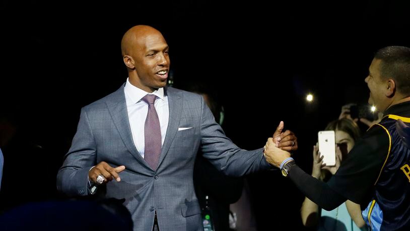 Former Detroit Pistons Chauncey Billups is introduced during an NBA basketball game against the Denver Nuggets, Wednesday, Feb. 10, 2016 in Auburn Hills, Mich. The Pistons retired Billups jersey during a halftime ceremony. (AP Photo/Carlos Osorio)