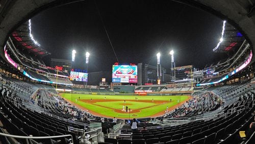 A view of SunTrust Park with only a few hundred fans in the stands after a three-hour-plus rain delay Tuesday night. (Photo by Scott Cunningham/Getty Images)