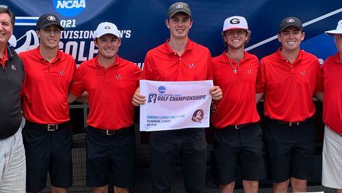 Georgia's Davis Thompson (center, with flag) accounted for 14 of the Bulldogs' 17 strokes under par to earn medalist honors in the NCAA Tallahassee Regional and lead the UGA men's golf team to the NCAA Championships for the 23rd time. (Photo from UGA Athletics)
