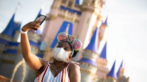 Starting Friday, Disney guests will have to wear masks while indoors and on resort transportation, regardless of vaccination status. Face coverings are optional when outside, and visitors younger than 2 will not be required to wear a mask. (Olga Thompson/Walt Disney World News/TNS)