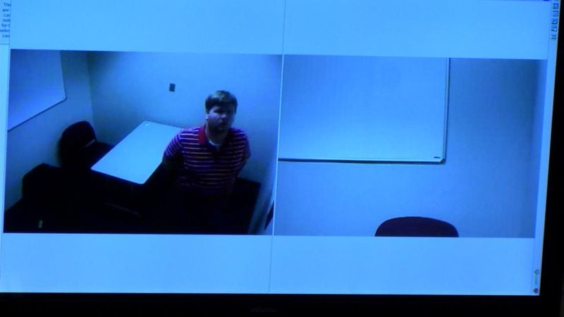 Justin Ross Harris is shown pacing the interrogation room as he waits for detectives to return, in this footage shown to jurors during Harris' murder trial at the Glynn County Courthouse in Brunswick, Ga., on Friday, Oct. 21, 2016. (screen capture via WSB-TV)