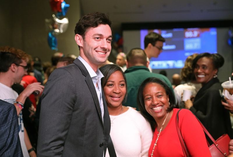 Jon Ossoff poses with Lucy McBath supporters during her watch party at the Westin Atlanta Perimeter North. Photo: Jason Getz