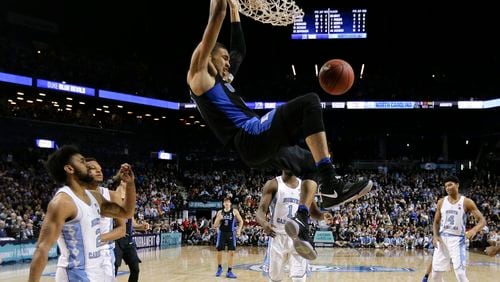 Duke forward Jayson Tatum dunks against North Carolina in the second half of the ACC semifinals on Friday, March 10, 2017, in New York. Duke won 93-83. (AP Photo/Julie Jacobson)