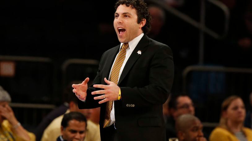 Georgia Tech head coach Josh Pastner directs his team against Cal State Bakersfield during the first half of an NCAA college basketball game in the semifinals of the NIT Tuesday, March 28, 2017, in New York. (AP Photo/Kathy Willens)