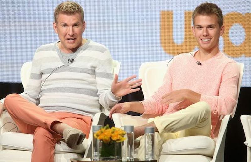 speaks onstage at the 'Chrisley Knows Best' panel during the NBCUniversal USA Network portion of the 2014 Summer Television Critics Association at The Beverly Hilton Hotel on July 14, 2014 in Beverly Hills, California. Todd Chrisley with his son Chase at TCA promoting "Chrisley Knows Best" on USA. CREDIT: Getty Images