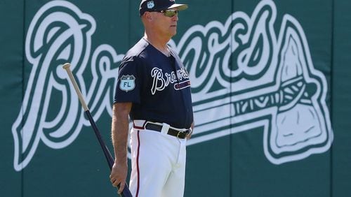 Braves manager Brian Snitker watches over spring training practice in Champion Stadium at Disney’s Wide World of Sports in Lake Buena Vista, Fla. (Curtis Compton/ccompton@ajc.com)