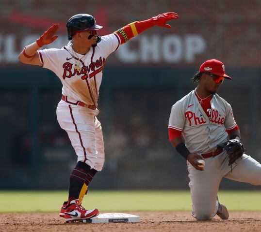 Atlanta Braves' William Contreras doubles during the fifth inning of game one of the baseball playoff series between the Braves and the Phillies at Truist Park in Atlanta on Tuesday, October 11, 2022. (Jason Getz / Jason.Getz@ajc.com)