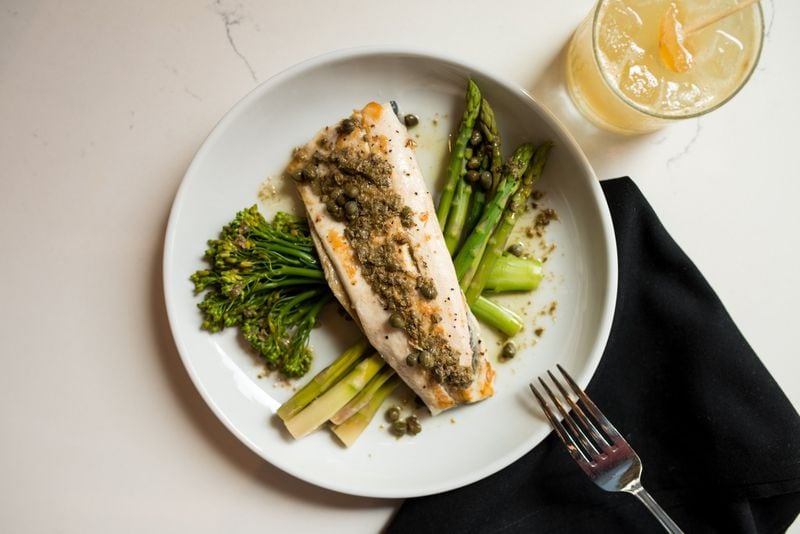 Seared Trout with lemon caper butter sauce, asparagus, and broccolini. Photo credit- Mia Yakel.