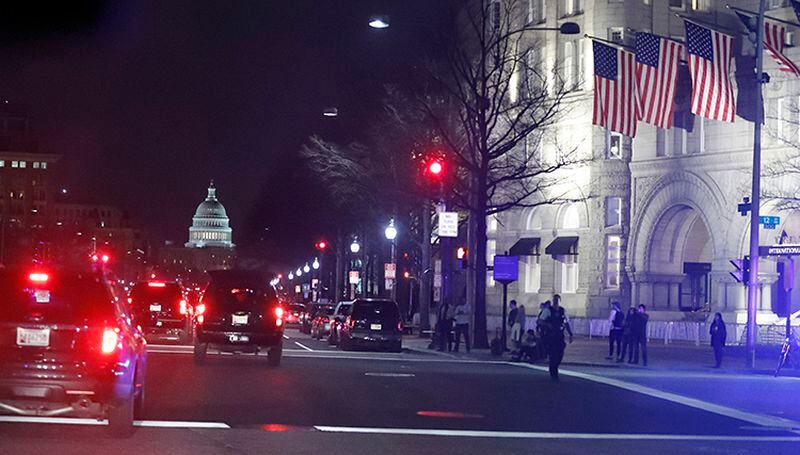President Donald Trump's motorcade heads down Pennsylvania Avenue as he goes to dinner at the Trump International Hotel, Saturday, March 25, 2017, in Washington.