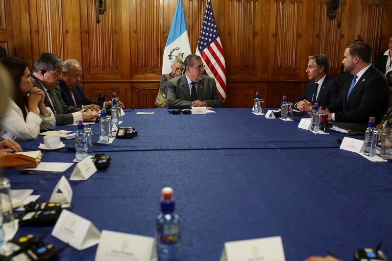 U.S. Secretary of State Antony Blinken, top right, meets with Guatemalan President Bernardo Arevalo, top, before a ministerial meeting on migration at the National Palace in Guatemala City, May 7, 2024. Blinken is in Guatemala for a two-day visit where he will attend a regional meeting on irregular migration. (Josue Decavele/Pool photo via AP)