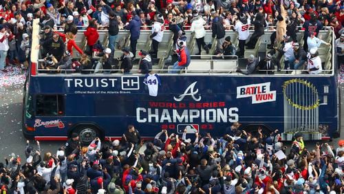 Fans cheer the World Series champion Atlanta Braves on Nov. 5 as they parade to Truist Park. (Curtis Compton/Atlanta Journal-Constitution/TNS)