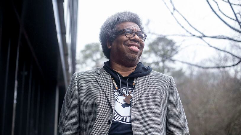 AJC reporter Ernie Suggs, the editor of the AJC Sepia Black History Month series, shows off his Afro in Dunwoody, Monday, Feb. 15, 2021. (Alyssa Pointer / Alyssa.Pointer@ajc.com)