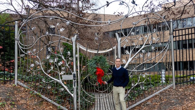 Eric Busko commissioned an iron gate at the Shepherd Center's Secret Garden as a 22-year anniversary present for his wife Mary. Unfortunately, she died shortly after leaving Shepherd and never got to see the gate. PHIL SKINNER FOR THE ATLANTA JOURNAL-CONSTITUTION