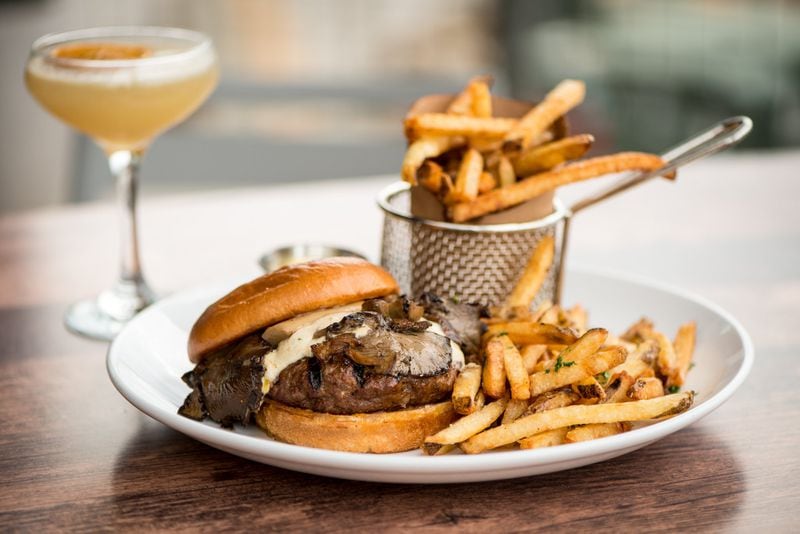 The Big Bleu Bison Burger with 8-ounce bison patty, sherried mushrooms, brioche, bleu cheese whip, and horseradish mustard. Photo credit- Mia Yakel