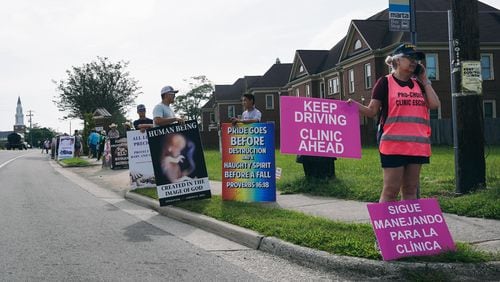 Protestors from Operation Save America canvas outside of an abortion clinic in Forest Park, Georgia on Friday, July 21, 2023. (Olivia Bowdoin for the Atlanta Journal-Constitution)