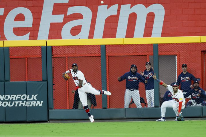 Atlanta Braves’ Michael Harris II throws the ball in so his teammates could complete the game-ending double play.  (Miguel Martinez / Miguel.Martinezjimenez@ajc.com)