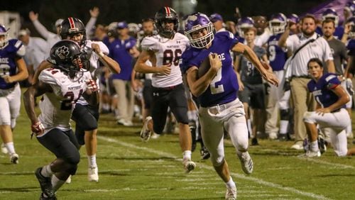 Chandler Byron (2) of Monroe Area ran for 2,795 yards last season, eighth-most in state history and best ever for a quarterback. (Photo by Brett Fowler/Walton Tribune)