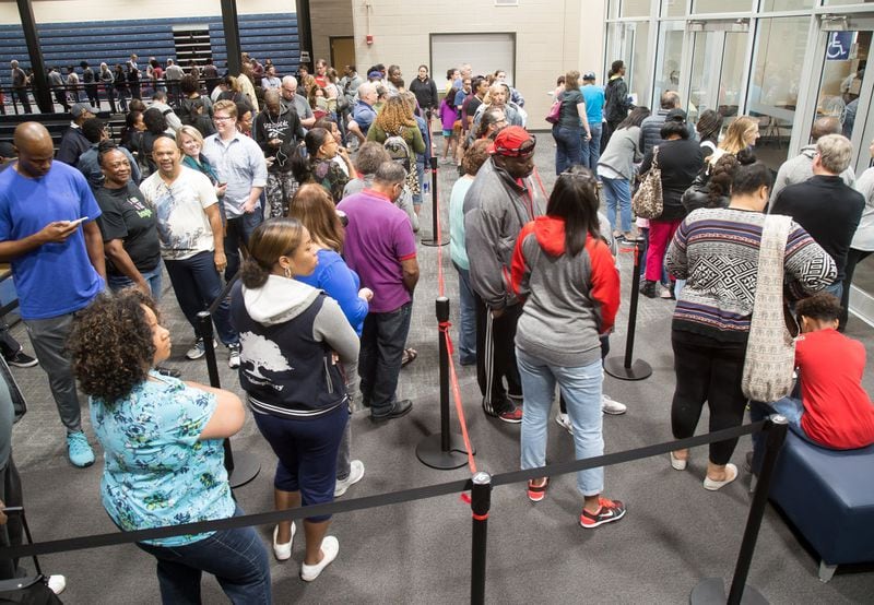 Cobb County residents stand in a long line to vote Saturday at the Cobb County Civic Center In Marietta, GA, October 29, 2016. At least 2000 people were expected to participate in the early voting there Saturday. STEVE SCHAEFER / SPECIAL TO THE AJC