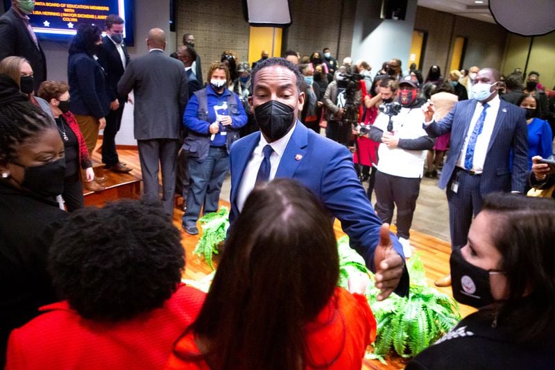 Atlanta Mayor Andre Dickens congratulates Atlanta Board of Education members after the swearing-in ceremony on Monday, Jan. 10, 2021.  (Steve Schaefer for The Atlanta Journal-Constitution) 