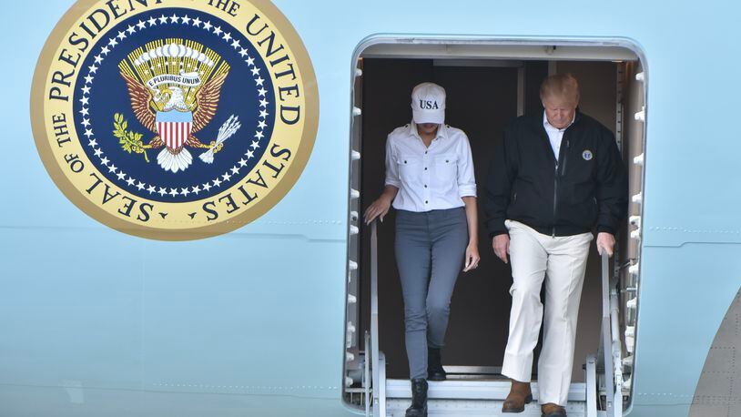 President Donald Trump and First Lady Melania Trump arrive at Robins Air Force Base to survey the damage left by Hurricane Michael.